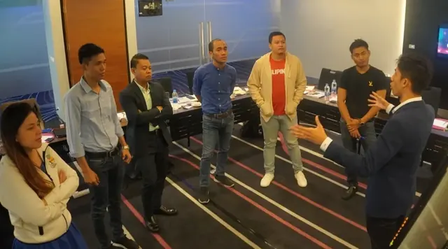 Hyder Taufik training a group