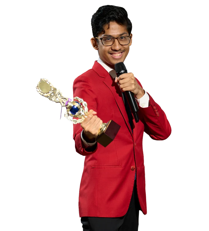 Hyder Taufik holding a trophy and microphone